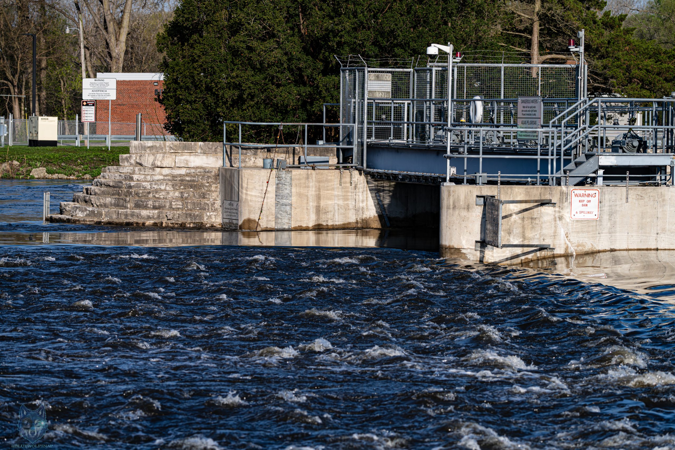 McHenry Dam on the Fox River running at flood stage with turbulent water, McHenry Illinois, Blue Wolf Snap