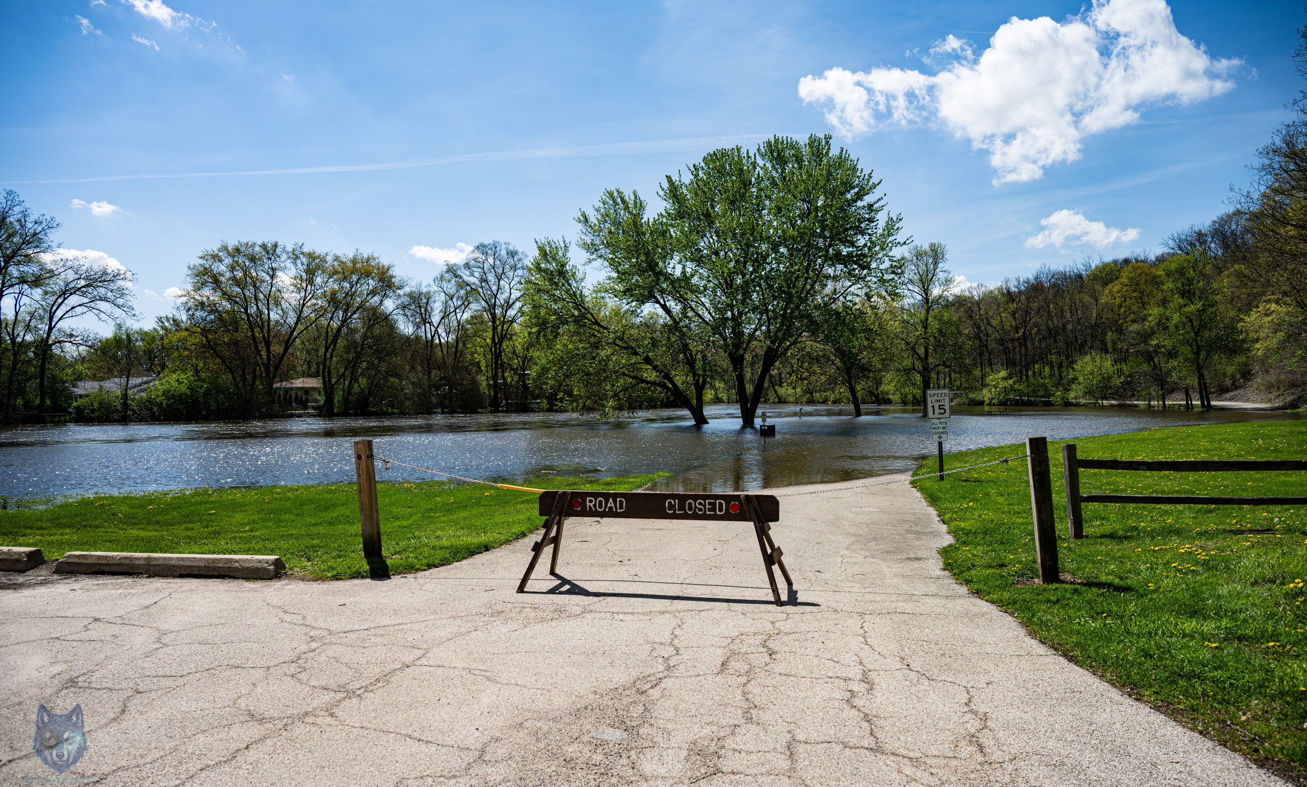 Road closed Fox River floodwater at forest preserve, McHenry County Illinois, Blue Wolf Snap
