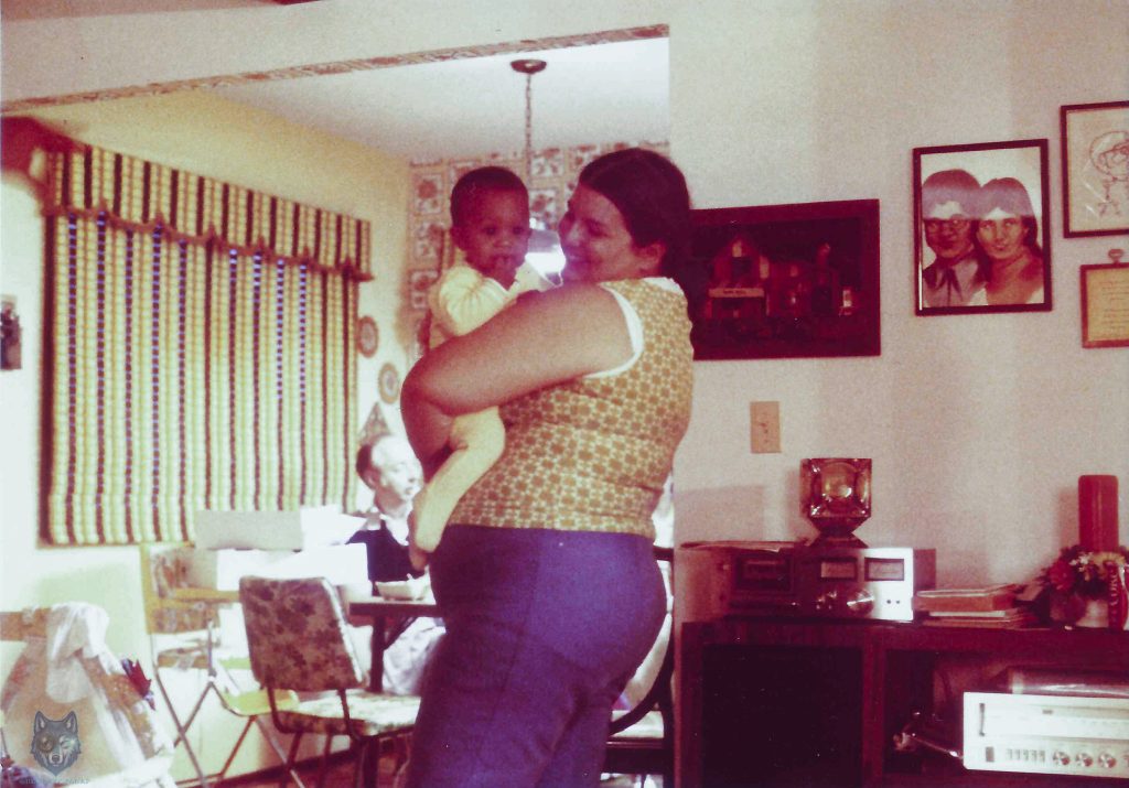 Brian Wright as an infant held by his mother in their NW Chicago burbs home, early 1980s